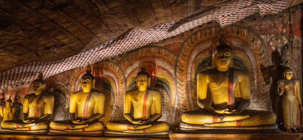 Home seated+buddhas+at+dambulla+cave+temple